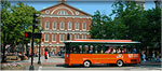 old town trolley passing by faneuil hall